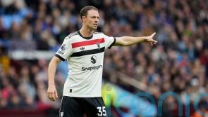 Jonny Evans insists Manchester United are battling to improve their fortunes