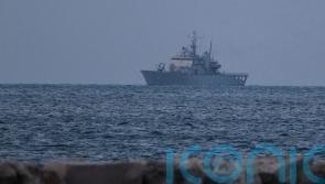 First Italian ship carrying intercepted migrants docks at Albanian port