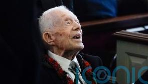 Former president Jimmy Carter, 100, votes in US election