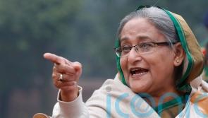 Bangladesh court issues arrest warrant for ex-PM over deaths of protesters