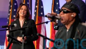 Stevie Wonder sings for Kamala Harris as she urges churchgoers to vote