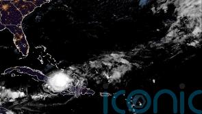 Tropical Storm Oscar heads toward the Bahamas after dumping rains on Cuba