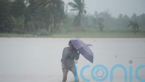 Deadly storm blows away from Philippines, but forecasters warn it may return