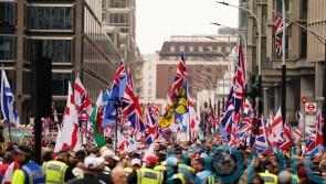 Thousands gather for Tommy Robinson’s protest as activist remains in custody