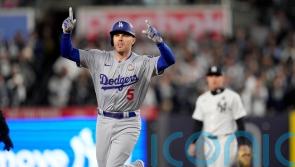 Los Angeles Dodgers hang on late to clinch third win of World Series