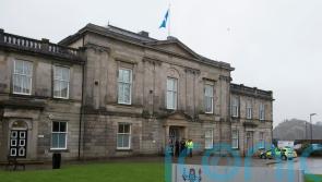 Man charged after bomb squad explode ‘device’ as homes evacuated