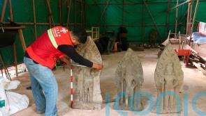 Cambodian archaeologists discover centuries-old statues at Angkor Unesco site