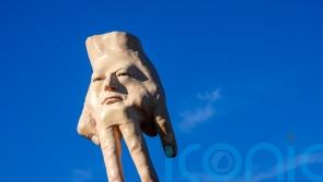 Controversial hand sculpture which towered over city to be removed
