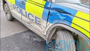 Two police officers injured after car rammed