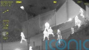 Aerial footage of Bonfire Night disorder shows yobs hurling objects at police
