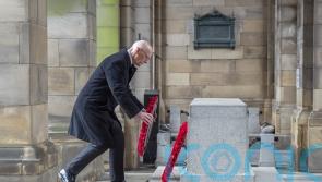 Swinney pays tribute to war hero uncle as nation pauses on Remembrance Sunday