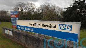 Pensioner died after being blown over by helicopter at hospital, inquest told