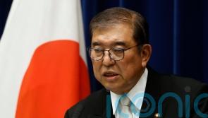 Re-elected Japanese PM vows to step up reform
