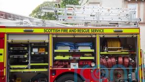 Fire engine in collision with two cars while travelling under blue lights