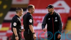 Ref David Coote suspended over video appearing to show him insult Jurgen Klopp