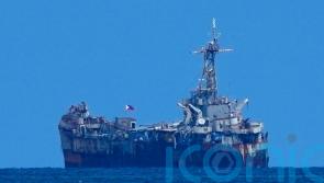 Philippine and Chinese forces avoid clash in disputed shoal under rare deal