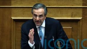 Former Greek premier expelled from ruling party