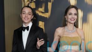 Angelina Jolie sports unbranded vintage gown with her son Knox Jolie Pitt at Governors Awards 2024