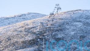 Snow falls across parts of UK after coldest night of the season