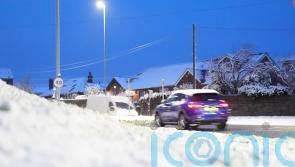 Trains cancelled and snow warnings issued as cold snap settles across the UK