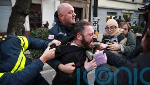Police in Georgia break up Tbilisi protesters’ camp but they quickly return