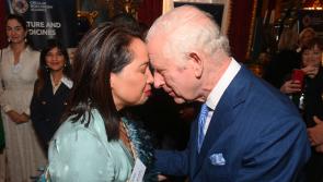 King shares traditional greetings with Maori attendee at charity launch