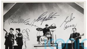 Signed Beatles photo and Sex Pistols lyrics sell for more than £130,000