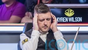 Kyren Wilson overcomes headache to thrash Stephen Maguire at UK Championship