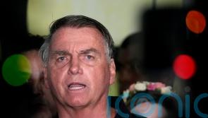 Brazil’s Bolsonaro planned and participated in coup plot, police report alleges