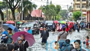 Three dead and more than 90,000 displaced amid flooding in Malaysia
