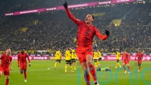Jamal Musiala saves point for Bayern in Der Klassiker after Harry Kane limps off