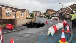Residents told to avoid area after large sinkhole appears on housing estate