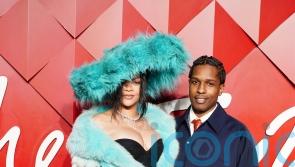 Rihanna steps out in maximalist turquoise fur at the Fashion Awards 2024