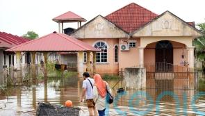 More than 30 dead as floods wreak havoc in Malaysia and southern Thailand