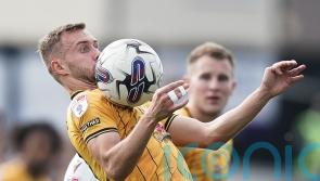 Shane McLoughlin’s late penalty snatches Newport a draw at AFC Wimbledon