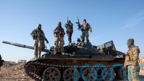 Syrian forces battling insurgents north of strategic city of Hama