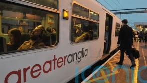 What proportion of rail services will be in public hands by the end of 2025?