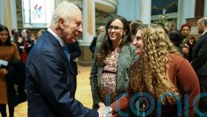 King thanks charity workers for their efforts in the Middle East