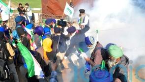 Police in India clash with farmers during protest march over crop prices