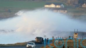 How can I drive safely in high winds?