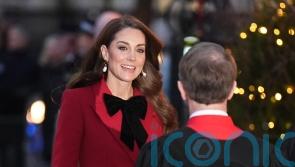 Kate sports festive bow ensemble at Christmas carol service