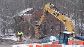 Searchers recover body in hunt for woman believed to have fallen into sinkhole