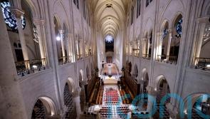 Bishop’s three knocks signify reopening of Notre Dame five years after blaze