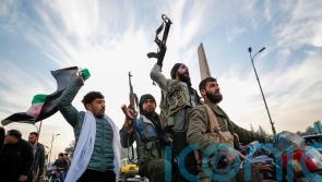 Syrian government falls to lightning rebel offensive as Assad flees