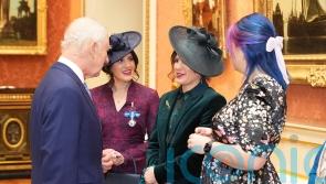 Twin who punched crocodile attacking her sister receives bravery medal from King