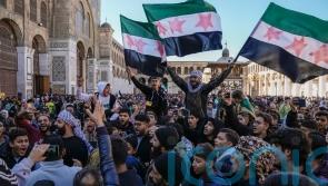 Thousands gather in Damascus to celebrate the toppling of Assad regime