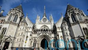 Alleged Chinese spy with links to Andrew named at High Court