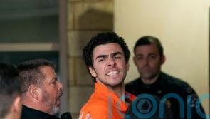 Suspect in health insurance boss killing charged with murder as act of terrorism