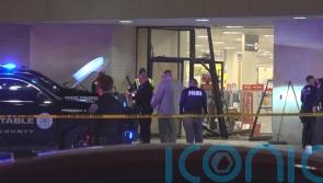 Five hurt as truck being chased by police driven through department store