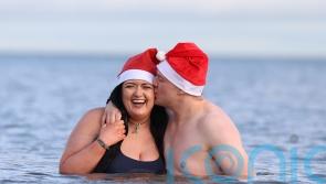 Couple who met at Helen’s Bay charity swim return for another festive dip